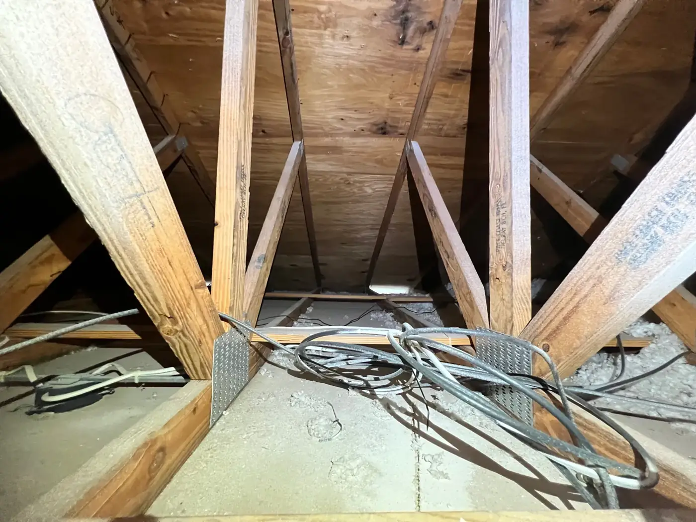 Roof trusses and decking in an attic