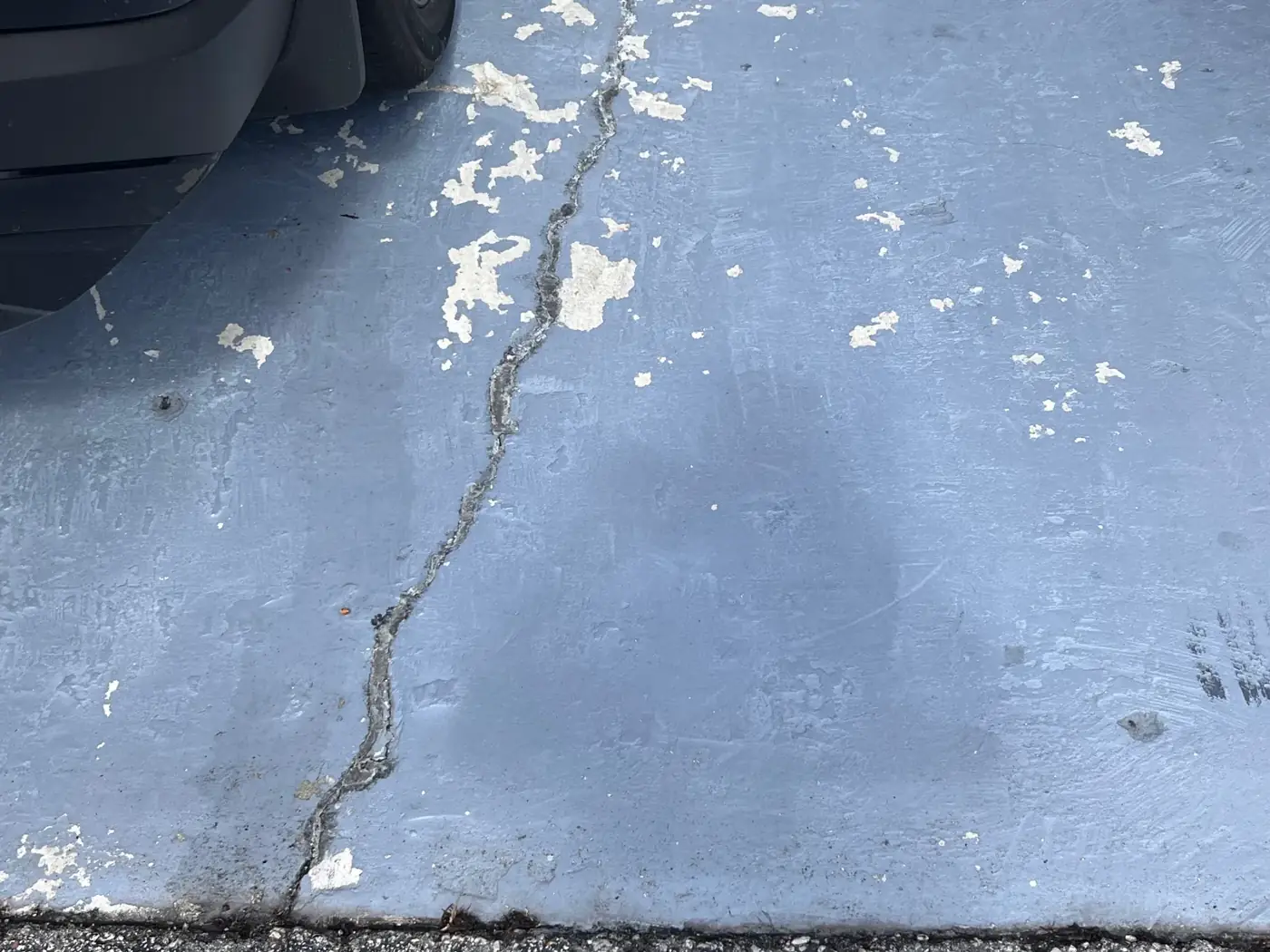 Crack running across a garage floor slab