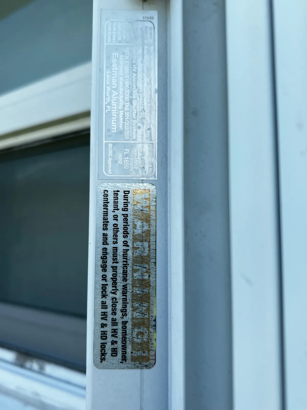 Hurricane shutter label with the Florida product approval number